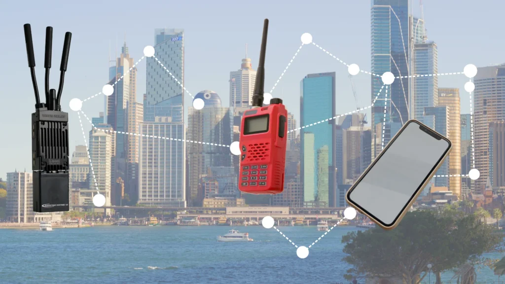 communication devices shown with an interconnecting graphic in a city scape